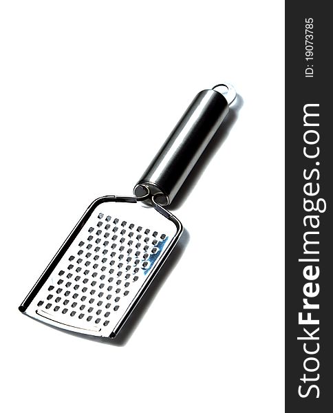 A Stainless Kitchen grater isolated used for cheese and fruits