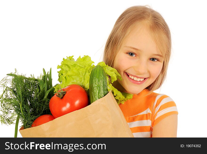 Girl with bag of vegetabl