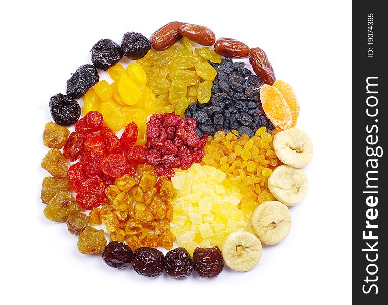 Assortment dried fruits on white