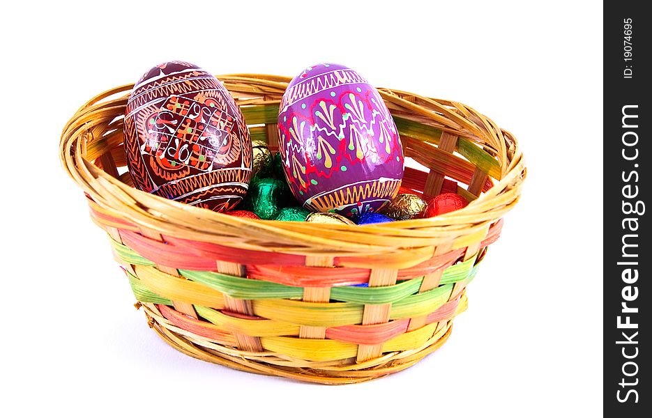 Painted eggs in a basket. Painted eggs in a basket.
