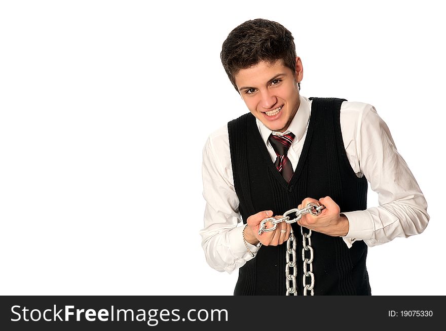 Businessman breaking the chain by hands for liberation as a symbol of work captivity
