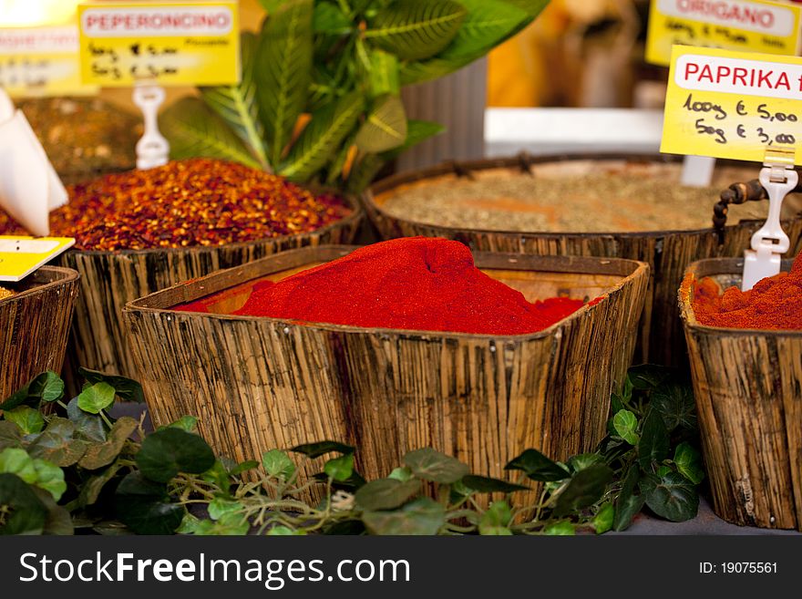 Colourful ground red hot pepper spices on a stall