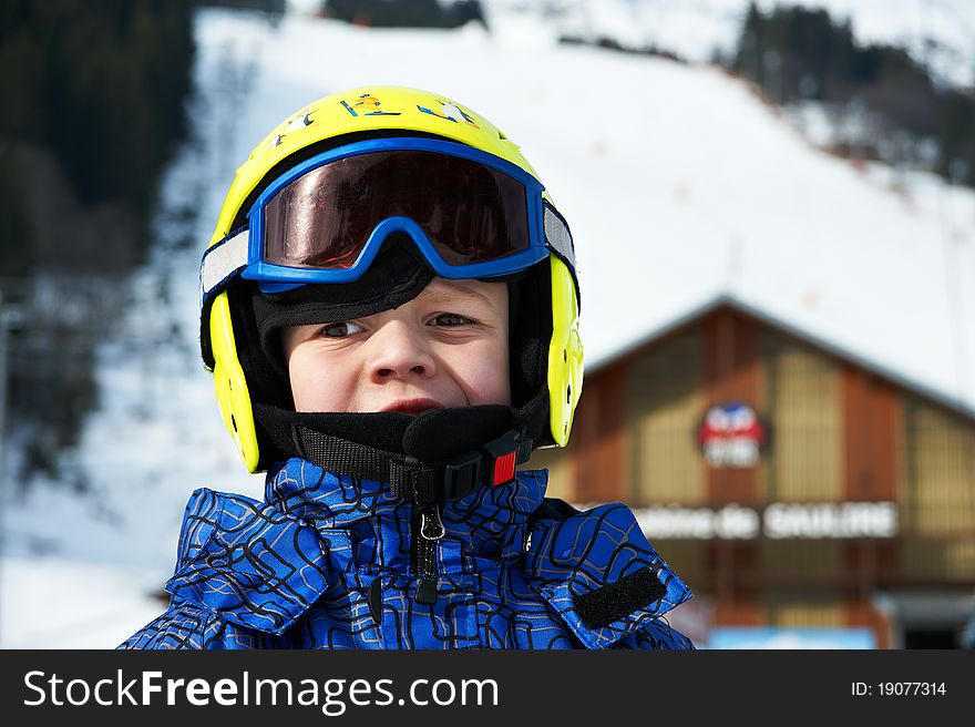 Portrait Of Child Wearing Helmet And Glasses Mask