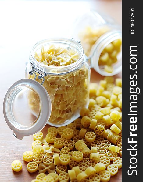 An image of yellow pasta in two jars. An image of yellow pasta in two jars
