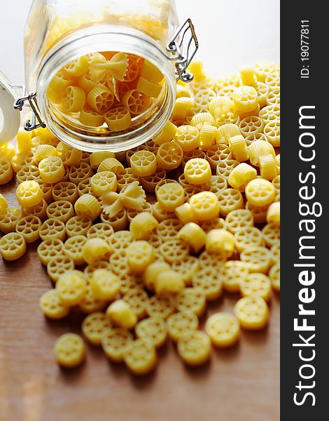 An image of yellow pasta on the kitchen table