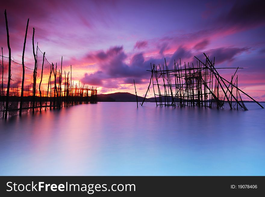 The fish trap stand during beautiful sky and smooth sea. The fish trap stand during beautiful sky and smooth sea