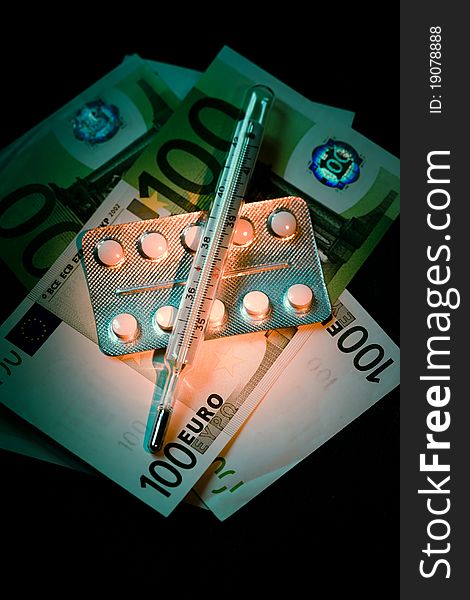 Banknotes with pills blister and thermometer. Banknotes with pills blister and thermometer