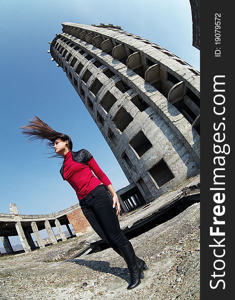 Girl with long hair in an unfinished building. Girl with long hair in an unfinished building