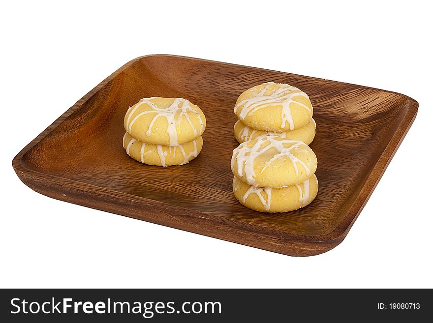 Biscuit dough with icing and jam filling.