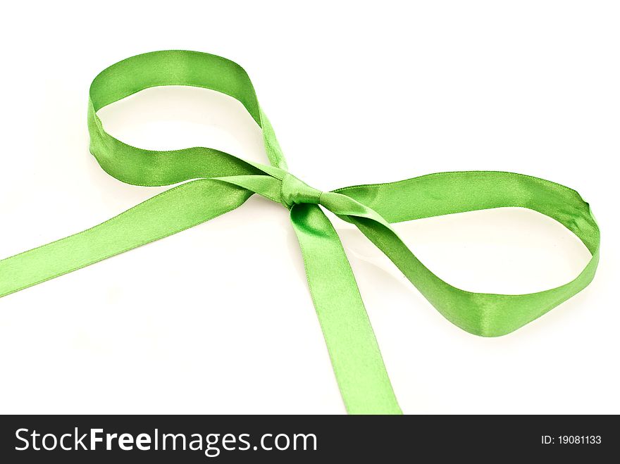 Decorative green bow isolated on white background