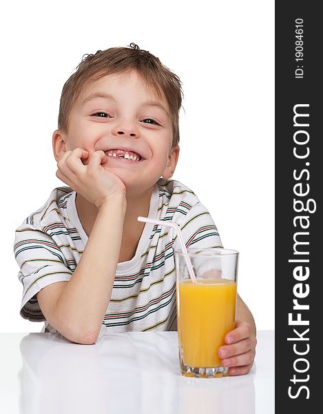 Little boy having a glass of refreshing oranges juice - isolated on white. Little boy having a glass of refreshing oranges juice - isolated on white