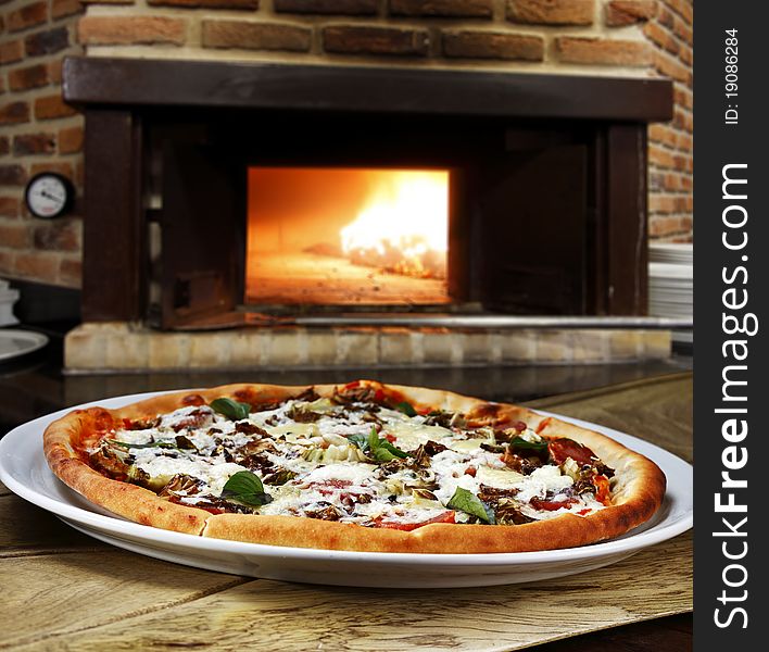 Pizza baked in wood oven