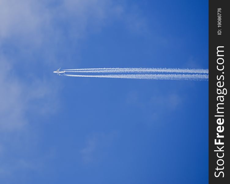 Jet contrail in deep blue sky