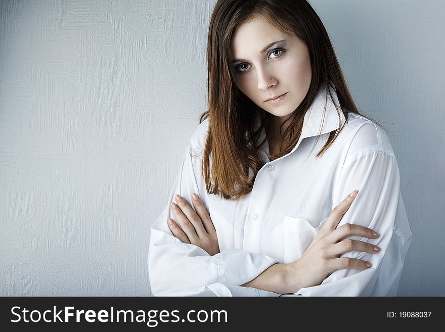 Portrait of a beautiful female model on white background