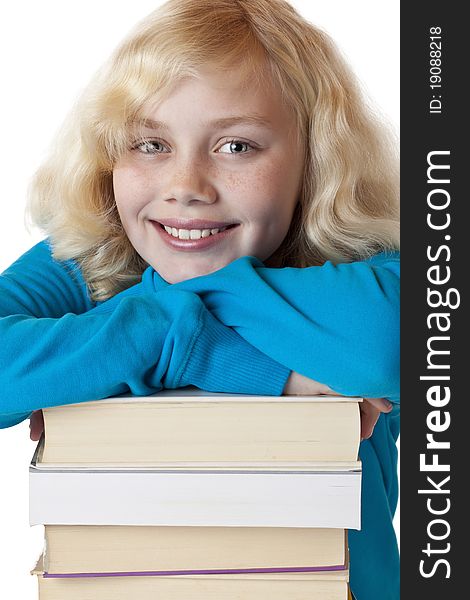 Portrait of a young beatiiful girl leaning on a pile of books.Isolated on white background. Portrait of a young beatiiful girl leaning on a pile of books.Isolated on white background.