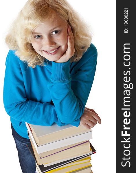 Young Pretty Schoolgirl Leans On Study Books Stack