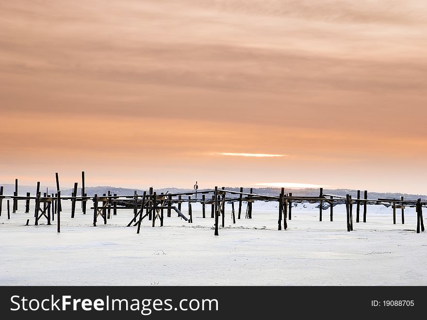 Red sky and wood pier on the Onsala fjord