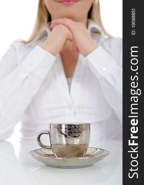 Pretty business woman drinking cup of espresso coffee. focus on the cup. Pretty business woman drinking cup of espresso coffee. focus on the cup