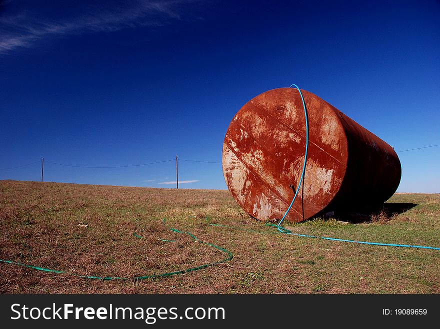 Rusting tank object in Bessarabia steppe, Ukraine