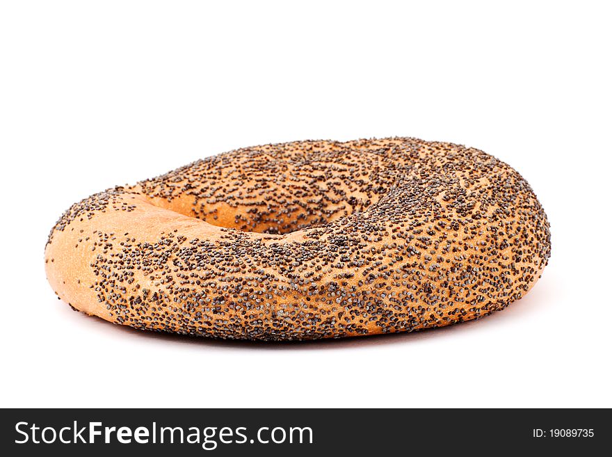 One Bagel With Poppy Seeds On White