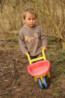 Boy With Wheelbarrow Royalty Free Stock Photo Boy With Wheelbarrow Royalty Free Stock Photo