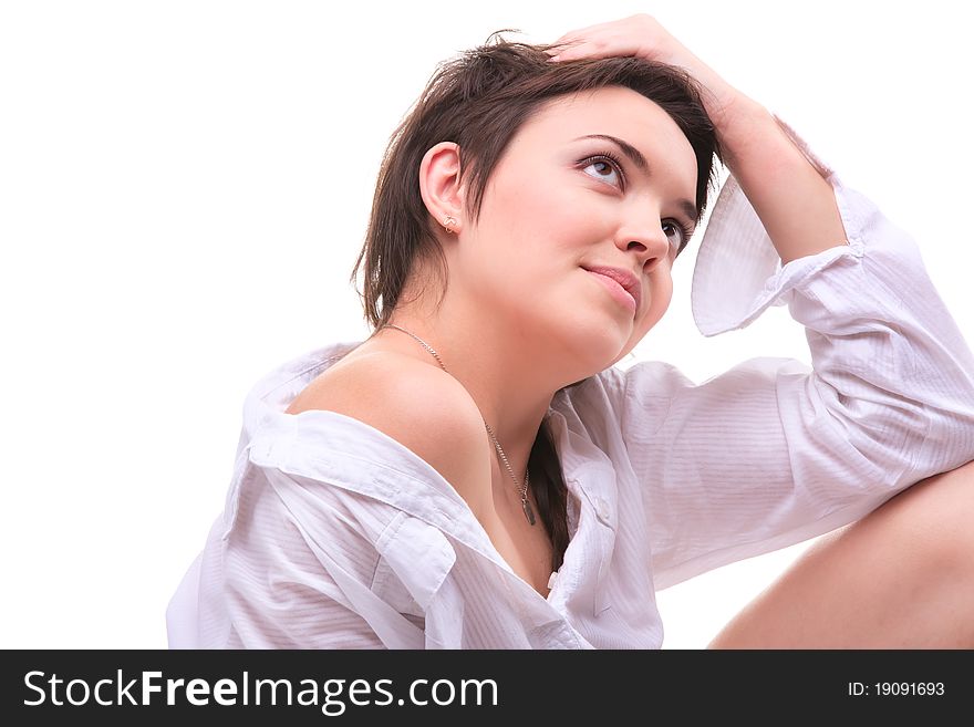 Young brunette woman posing in white shirt. Young brunette woman posing in white shirt