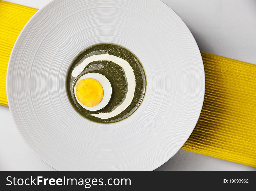 Sorrel dish with boiled egg on a plate