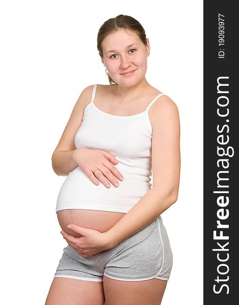Adorable pregnant woman over white. Adorable pregnant woman over white