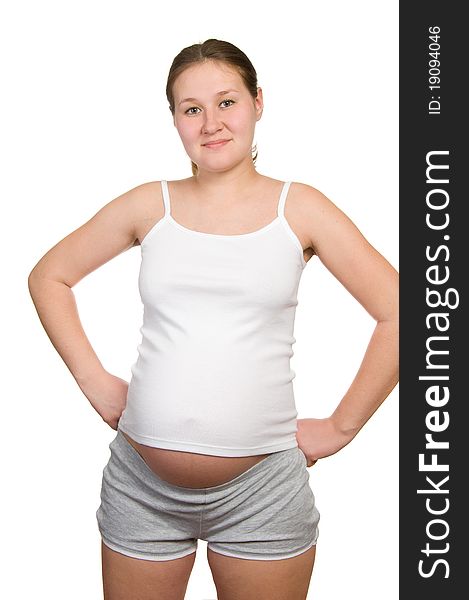 Beautiful pregnant woman over white