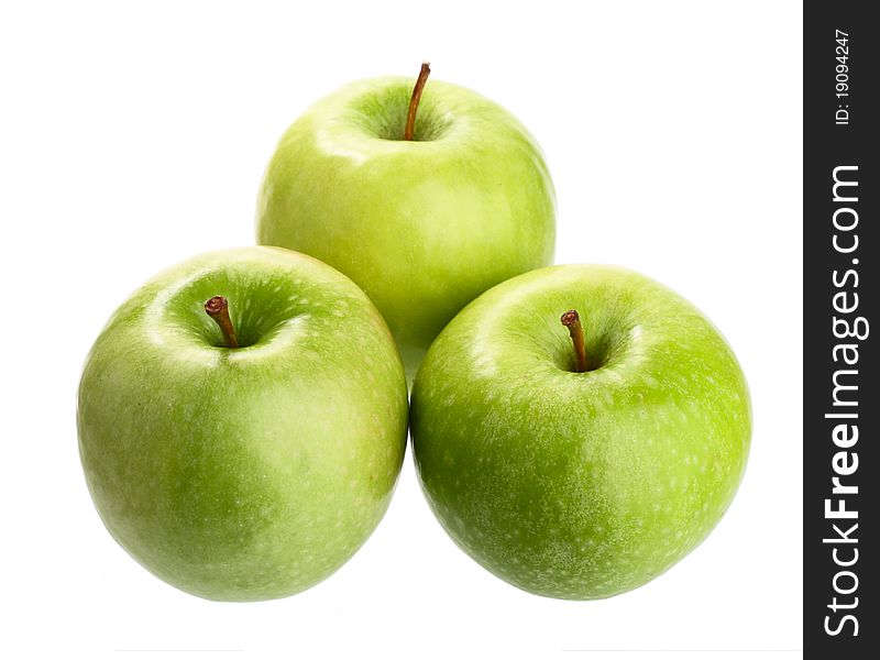 Three ripe green apples. Isolated on white background