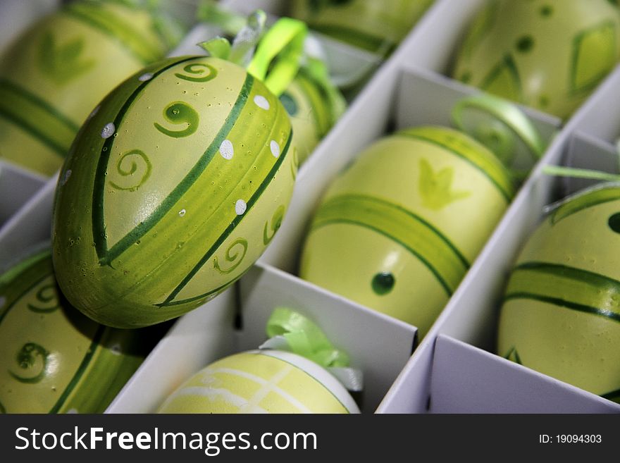 Green Easter eggs in a box