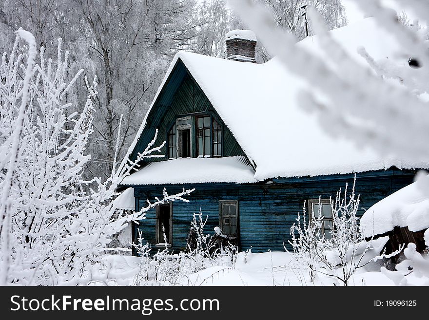 Winter. Snowy blue house. It looks like forgotten. Winter. Snowy blue house. It looks like forgotten.