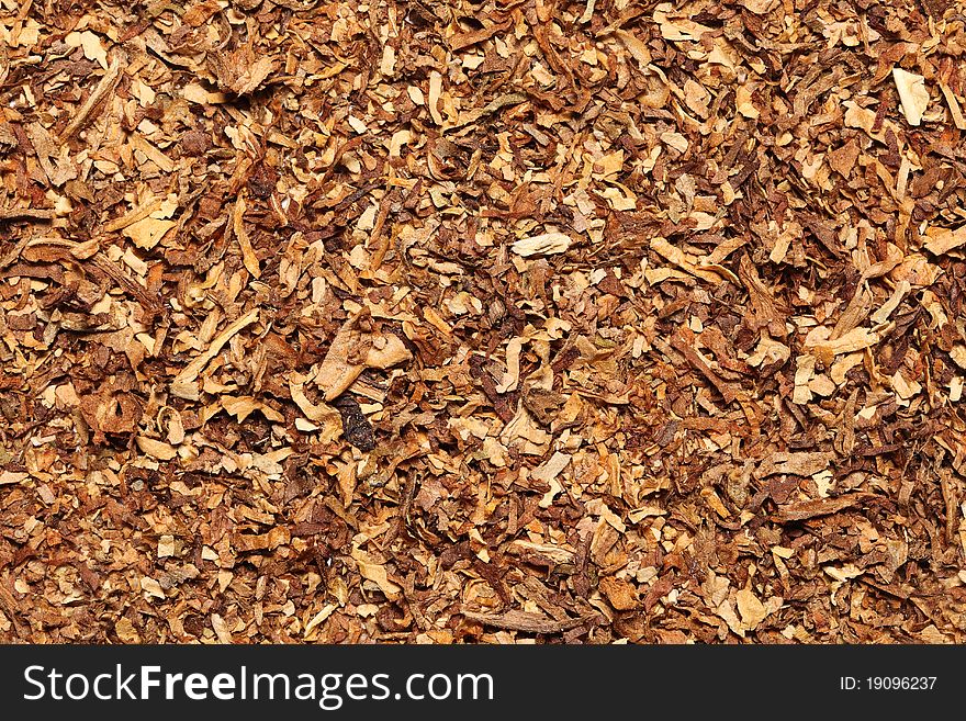 Textured background made from spilled of tobacco. Textured background made from spilled of tobacco