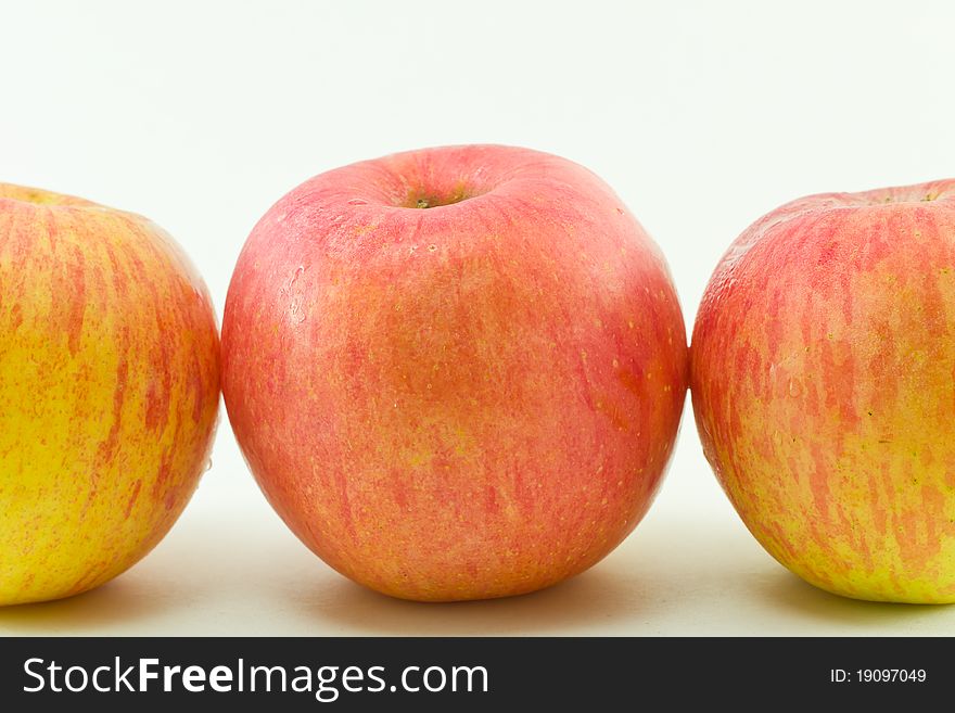 Three apples on white background