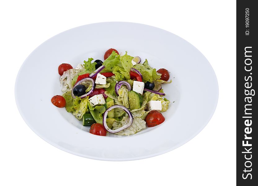Juicy, fresh salad in a plate on a white background. Juicy, fresh salad in a plate on a white background