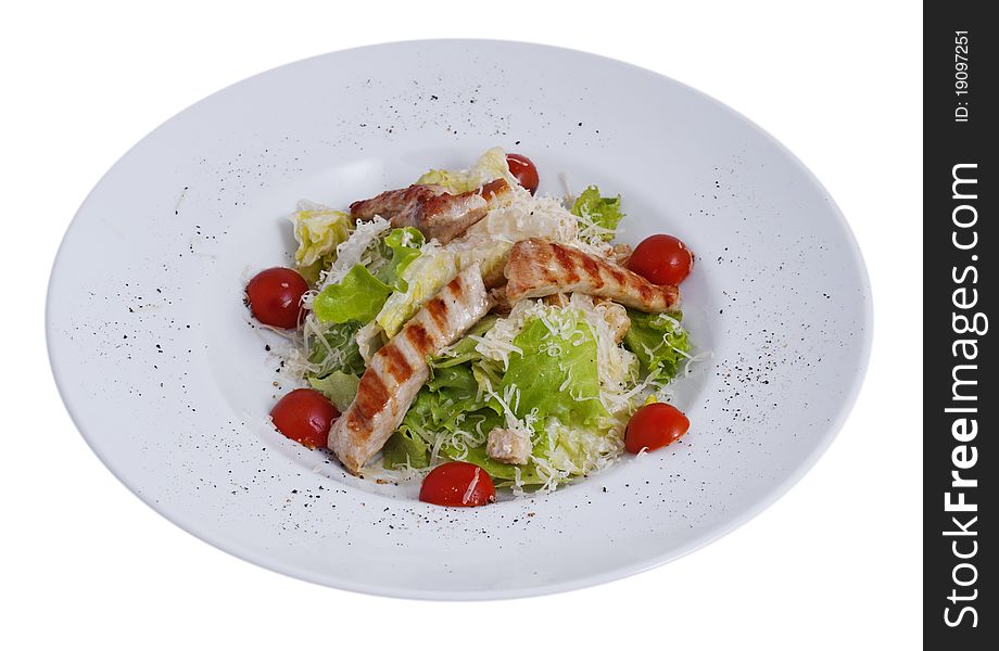 Juicy, fresh salad in a plate on a white background. Juicy, fresh salad in a plate on a white background