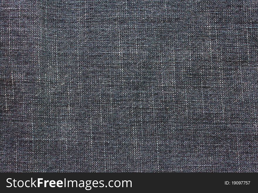 Close - up of the blue jeans background or texture