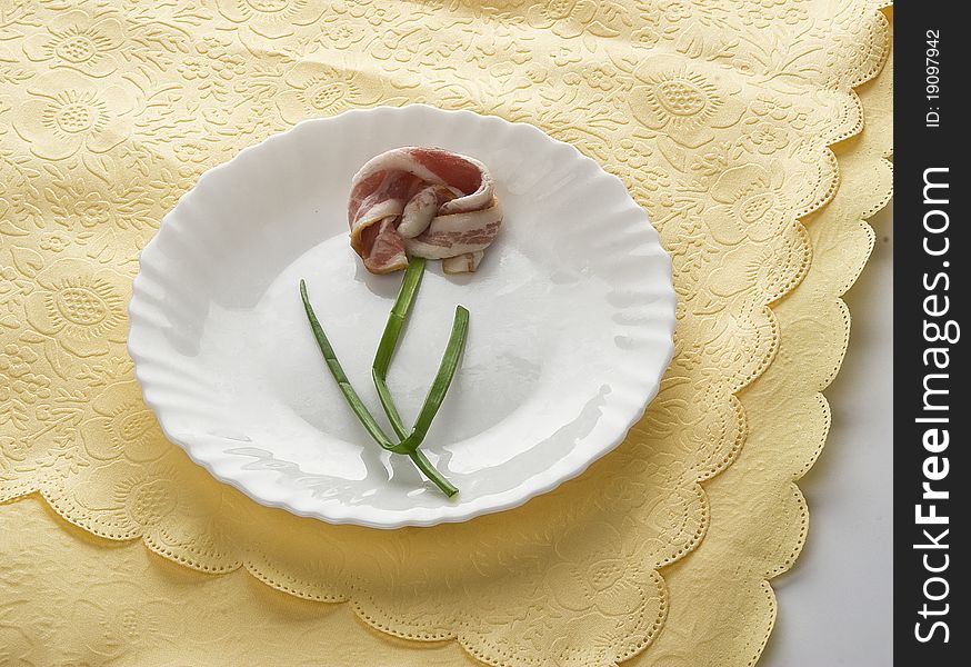 Bacon on the plate as flower