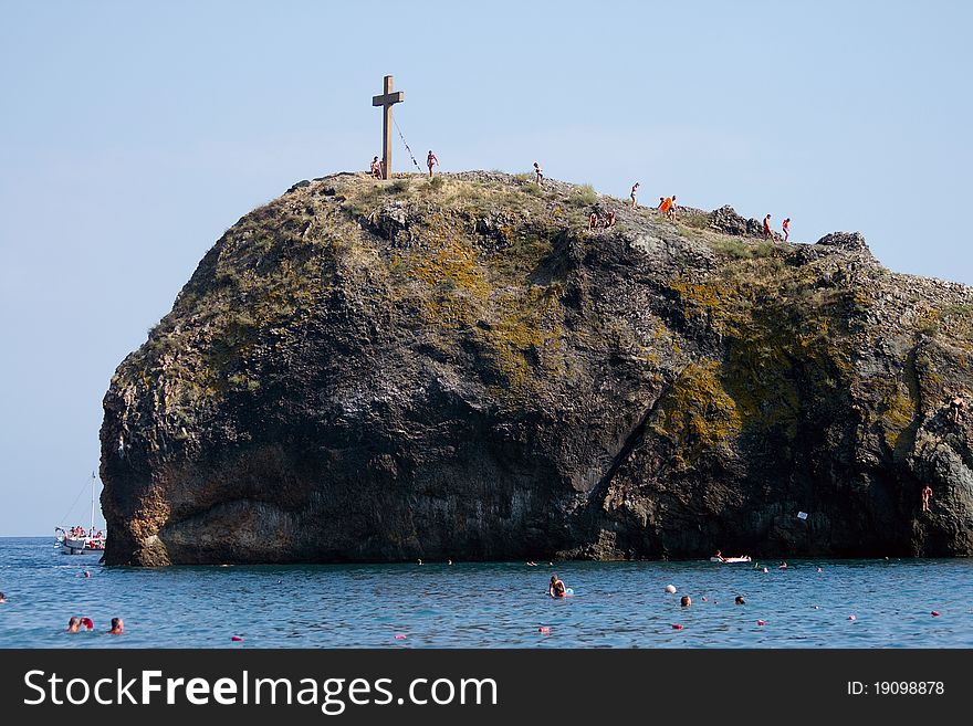 Limestone rock with christian cross