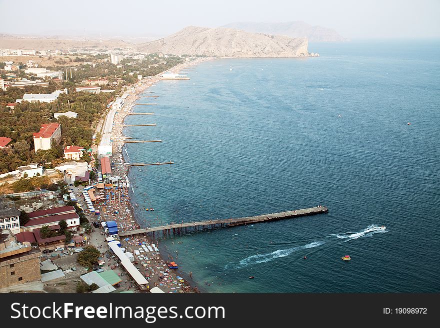 Bird's eye view of long beach and mountains