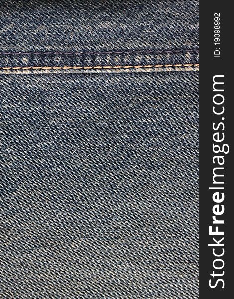 Close - up of the blue jeans background or texture