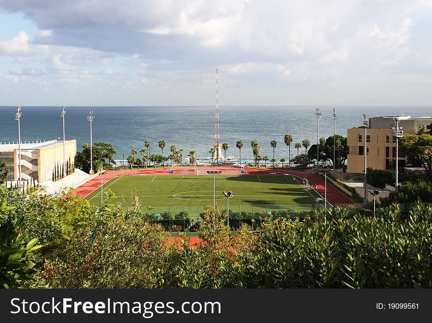 A footbal playground in a university near the sea. A footbal playground in a university near the sea