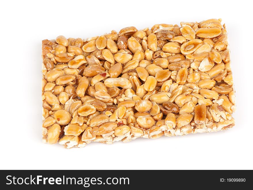 Nuts in honey isolated on a white