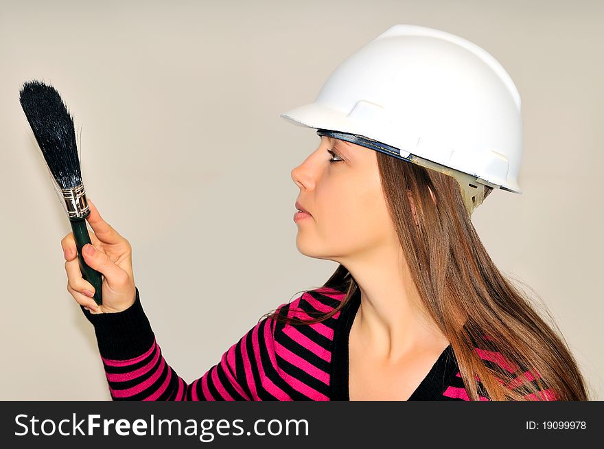 Girl In A Helmet With A Paintbrush