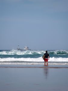 A Surfer Watching The Waves Royalty Free Stock Images A Surfer Watching The Waves Royalty Free Stock Images
