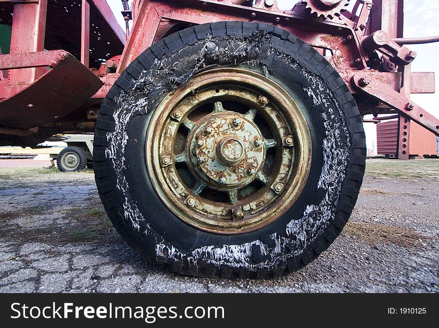 Old Shredded Black Tractor Tire. Old Shredded Black Tractor Tire
