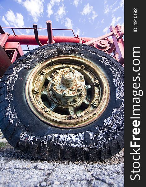 Verticle Old Flat Shredded Tractor Tire. Verticle Old Flat Shredded Tractor Tire