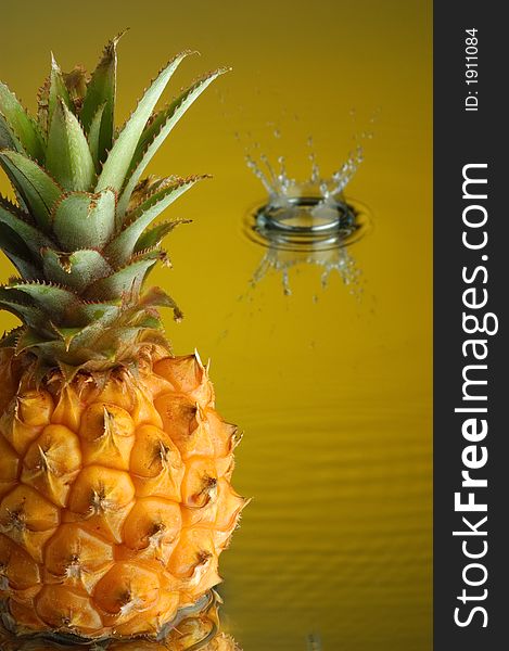 Pineapple, water and mirror surface. Pineapple, water and mirror surface