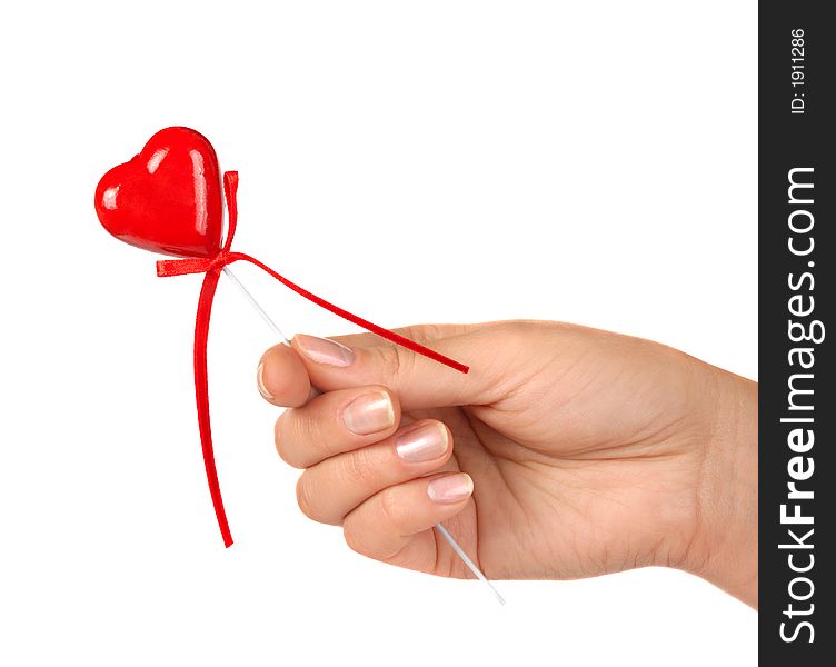 Female hand holding little red heart Valentine Day concept Isolated on white background. Female hand holding little red heart Valentine Day concept Isolated on white background
