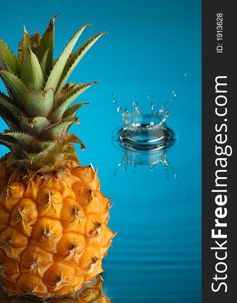 Pineapple, water and mirror surface. Pineapple, water and mirror surface